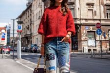 With red loose sweater, red pumps and purple chain strap bag