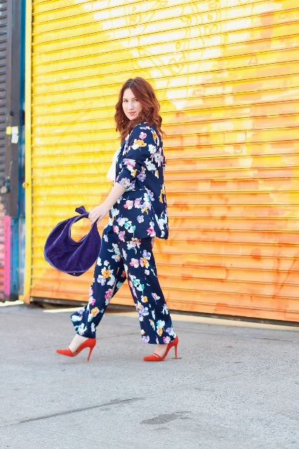 With white blouse, blue bag and red pumps
