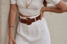 With white crop blouse, white wide leg pants and brown leather bag