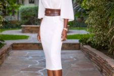 With white midi dress and brown pumps