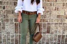 With white ruffled blouse, olive green trousers, leopard flat shoes and brown small bag