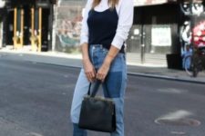 With white shirt, black top, black leather bag and black sandals