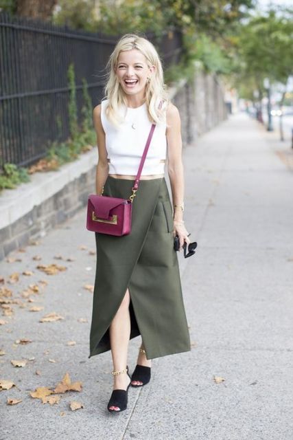 With white top, olive green wrapped maxi skirt and purple crossbody bag