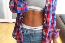 a shiny rhinestone floral belly button piercing is always a chic and bold idea