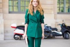 an emerald pantsuit with a long blazer, a clutch and neutral shoes for a bold and colorful statement