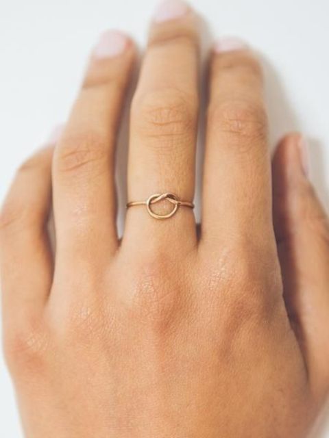 an infinity gold knot ring for a pretty and sentimental accent on your hand