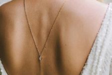 04 a minimalist back necklace with a duo of diamonds is a chic idea that can be worn to a special occasion