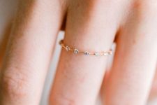 04 a minimalist gold ring dotted with diamonds is a very beautiful and shiny jewelry idea