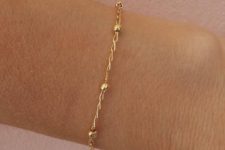 07 a minimalist gold chain bracelet with tiny beads is a timeless idea that will always be in trend