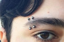 10 double dark stud male eyebrow piercing will accent your look a lot