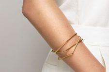 16 a stack of gold geometric bracelets is a chic and stylish idea to complete your minimalist outfit