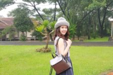 With backpack, gray skater skirt and top