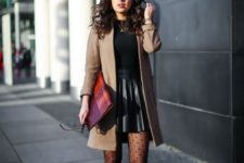 With black shirt, beige coat, brown boots, printed tights and colorful clutch