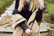 With black shirt, necklace, black leather small bag, leopard leggings and beige coat