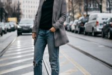 With black shirt, tweed blazer, distressed jeans and black embellished boots