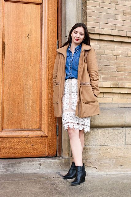 With denim shirt, beige coat and black leather ankle boots