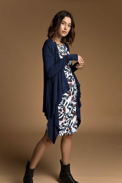 With floral printed knee length dress and black leather boots