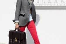 With gray blazer, black bag and red pants