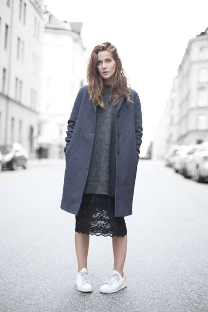 With gray oversized sweater, white sneakers and dark gray coat