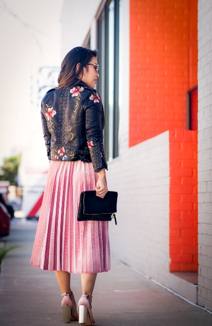 With pale pink pleated midi skirt, metallic shoes and black clutch