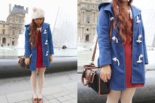 With red dress, blue coat, two colored bag and brown shoes