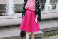 With striped blouse, pink A-line skirt, white sneakers and black bag