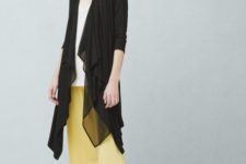 With white top, yellow wide leg trousers and black flat shoes