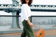 a white shirt, green oversized wideleg pants, yellow shoes and a camel bag for an outfit in fall colors