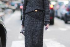 06 a black knit suit with a maxi skirt and a turtleneck sweater, black booties and a belt by Olivia Palermo