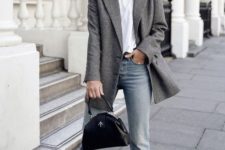 08 a whitte tee, an oversized grey blazer, blue jeans with a raw hem and black shoes and a small bag are a classic look