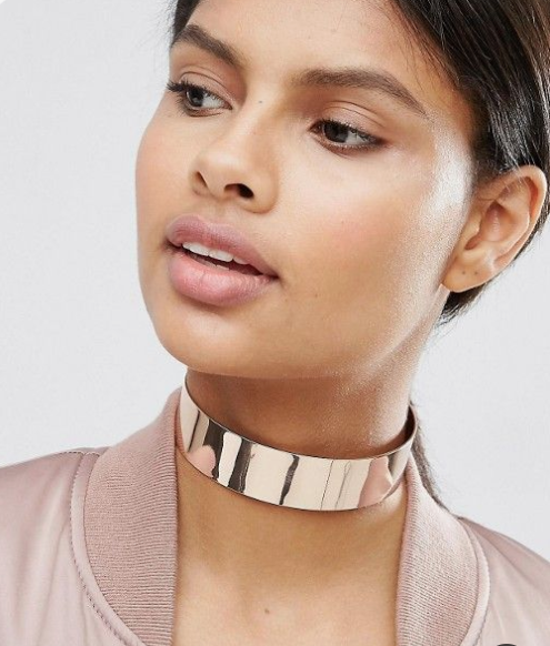 a wide metal choker necklace will make a statement in any outfit, even the simplest one