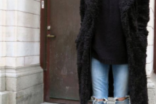 13 a bold outfit with a black faux fur coat and a blush fedora hat is a stylish option for winter