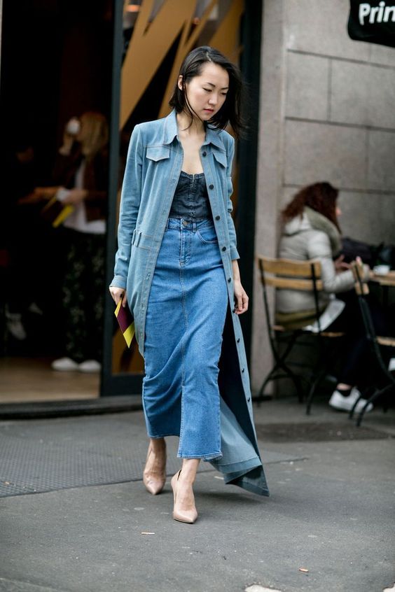 a full denim look with a dark denim top, a blue maxi skirt and a blue denim trench on buttons plus nude shoes