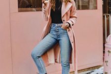 15 blue cropped jeans with a raw hem, black combat boots, a black turtleneck, a pink trench and a beret
