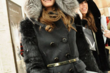 26 a belted coat with a faux fur hat for a bold and trendy winter outfit