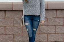 With gray bag, distressed jeans and gray cutout boots