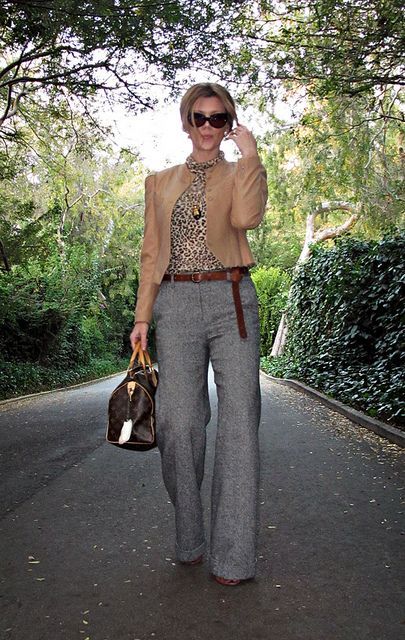 With leopard blouse, brown blazer, brown belt, printed bag and boots