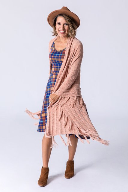 With plaid knee length dress, hat and brown suede ankle boots