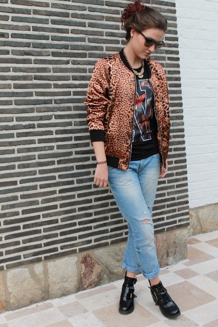 With printed t-shirt, cuffed jeans and black boots