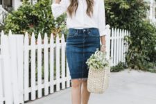 With white button down shirt, denim skirt, suede flat shoes and tote bag