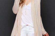 With white loose top and white distressed jeans
