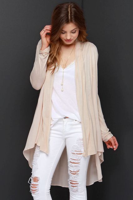 With white loose top and white distressed jeans