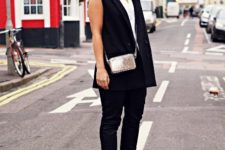 With white shirt, silver mini bag, black pants and black ankle boots