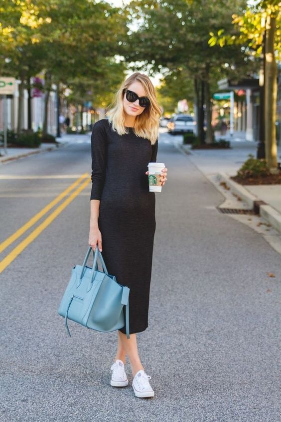 a black midi dress with high neckline and long sleeves, white sneakers and a blue bag for this fall and winter