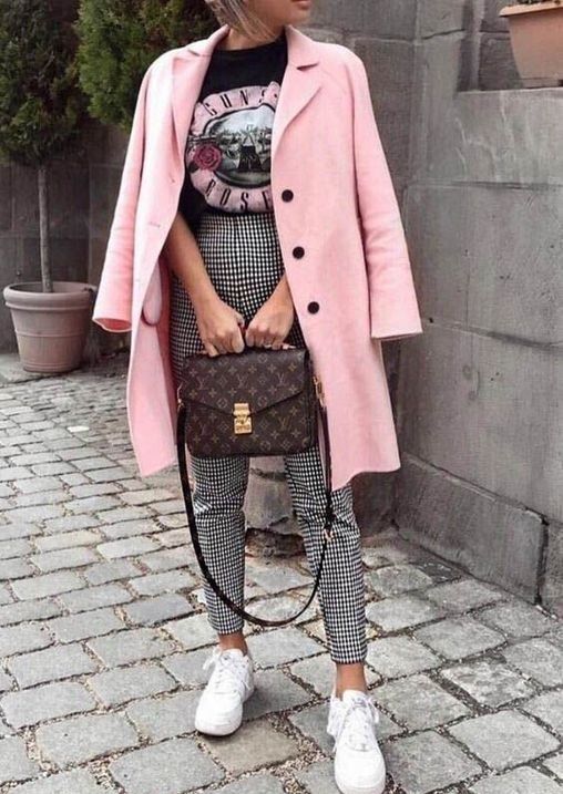 a bright outfit with a printed tee, printed cropped pants, white sneakers, a pink coat and a brown box bag
