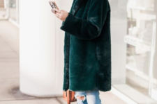 a forest green faux fur coat will add a bold touch of color and a trendy fele to the look
