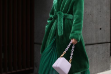 a whimsical look done in emerald and purple with a midi emerald faux fur coat for a refined touc