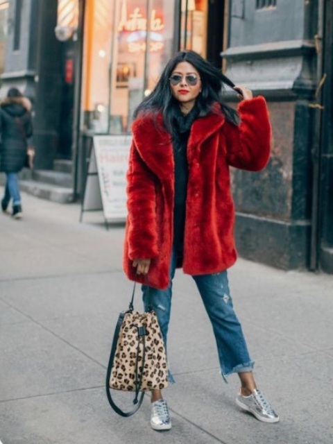 add brightness to your look with silver sneakers, an animal print bag and a red faux fur coat