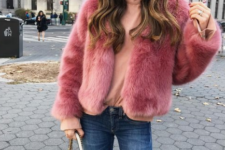 an everyday look spruced up with a bright short pink faux fur coat and a white bag is amazing