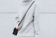 02 a minimalist look with a dove grey sheath dress, a matching oversized sweater, a black bag for winter